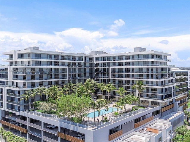 view of property featuring a community pool