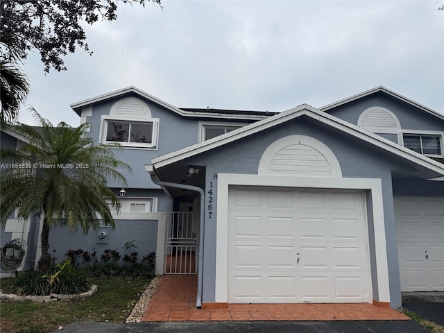 view of front property with a garage