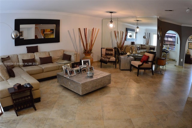 living room featuring crown molding