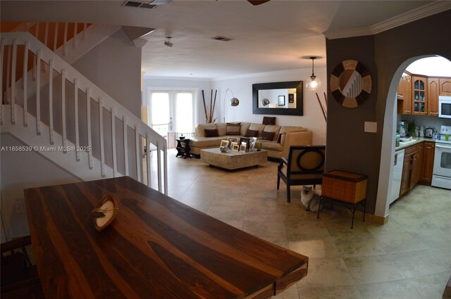 interior space featuring crown molding