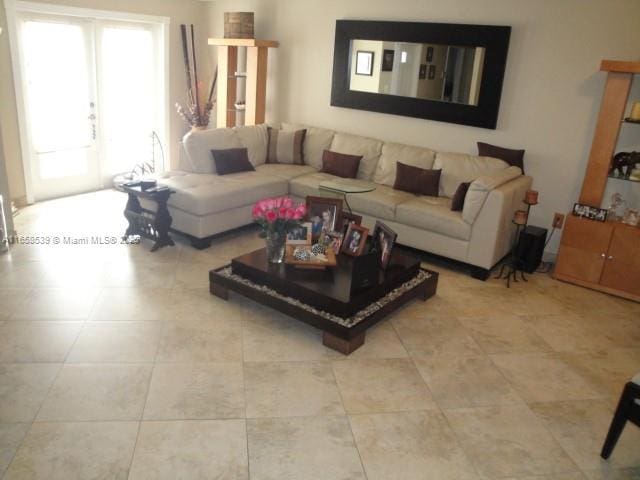 living room with light tile patterned floors