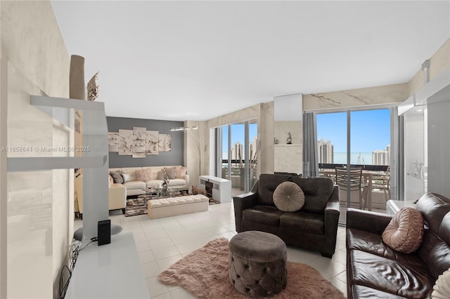 living room with plenty of natural light and light tile patterned floors