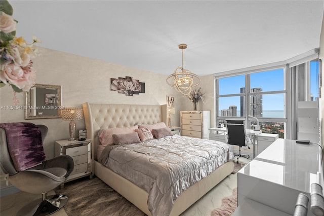 bedroom featuring a chandelier