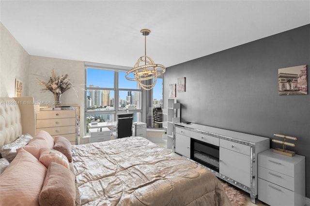 bedroom featuring an inviting chandelier