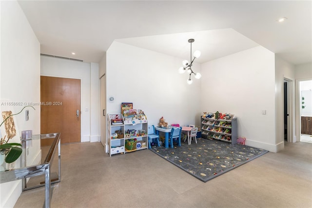 game room with a notable chandelier