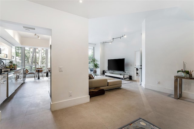 living room featuring track lighting