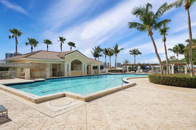 view of pool featuring a patio area