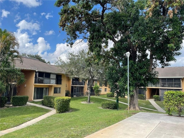 view of community with a yard