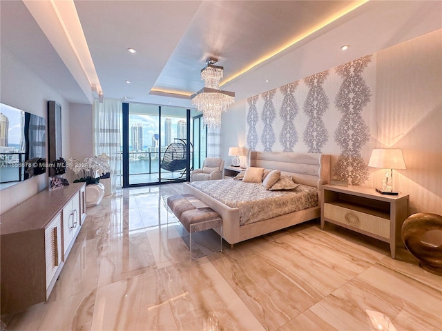 bedroom with access to outside, expansive windows, recessed lighting, a raised ceiling, and a chandelier