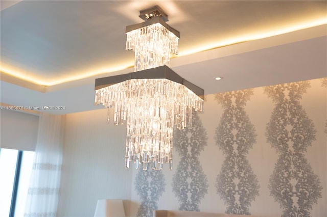 details with an inviting chandelier