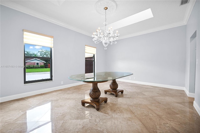 dining space featuring a skylight, an inviting chandelier, and ornamental molding