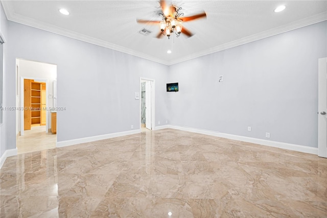 empty room with ceiling fan and ornamental molding