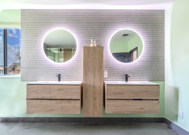 bathroom featuring tile patterned floors and vanity