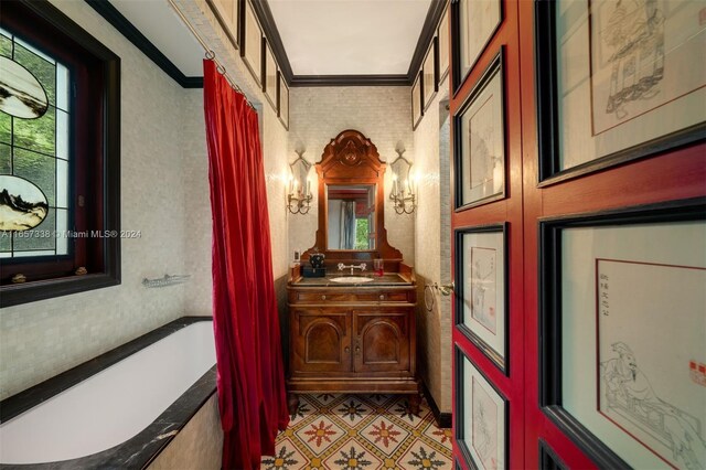 hallway with crown molding and sink