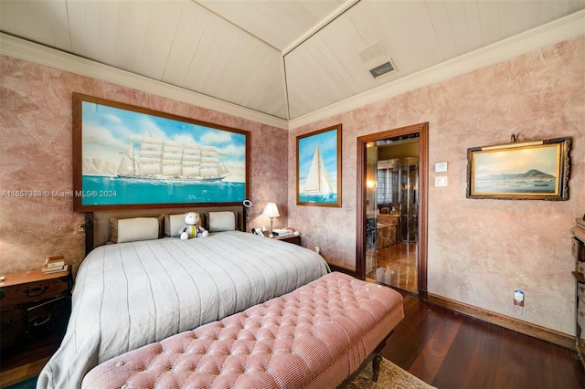 bedroom with ornamental molding and hardwood / wood-style flooring