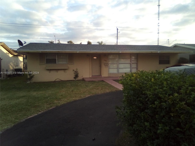 exterior space with a lawn