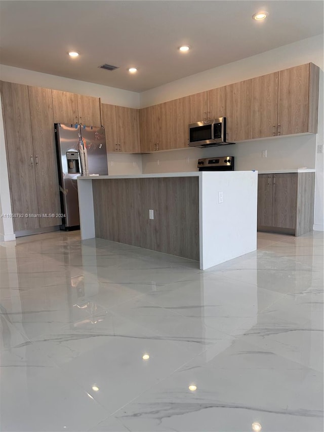 kitchen with appliances with stainless steel finishes