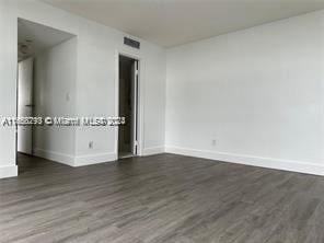 13499 Biscayne Blvd Unit 801, North Miami, FL 33181 - empty room featuring baseboards and wood finished floors