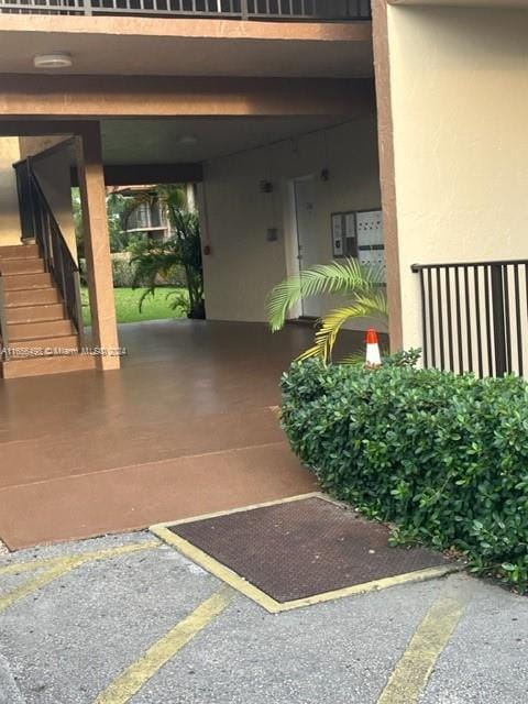 10411 SW 108th Ave Unit 153, Miami, FL 33176 - view of exterior entry featuring stucco siding