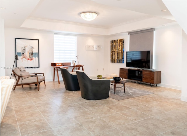 living room featuring crown molding, a raised ceiling, and light tile patterned floors