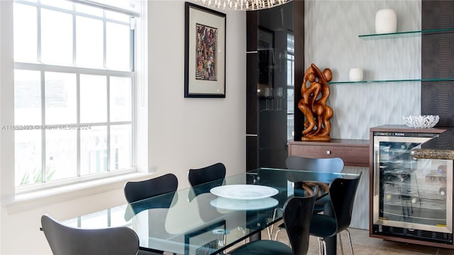 tiled dining space featuring wine cooler