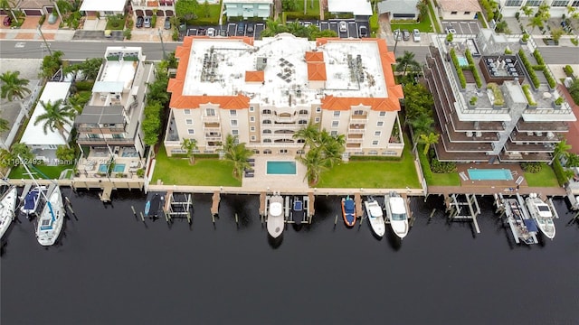 drone / aerial view with a water view