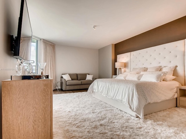 bedroom featuring wood-type flooring