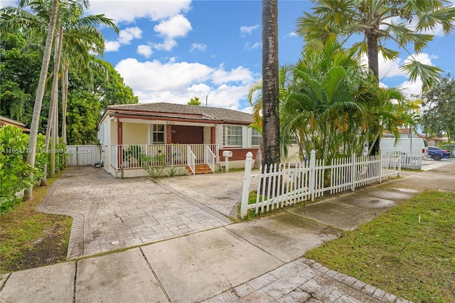 4330 SW 2nd St, Miami, FL 33134 - view of front of house featuring a porch