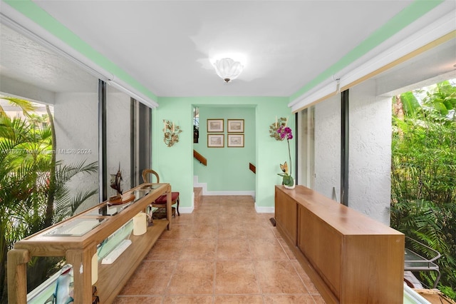 interior space with light tile patterned floors