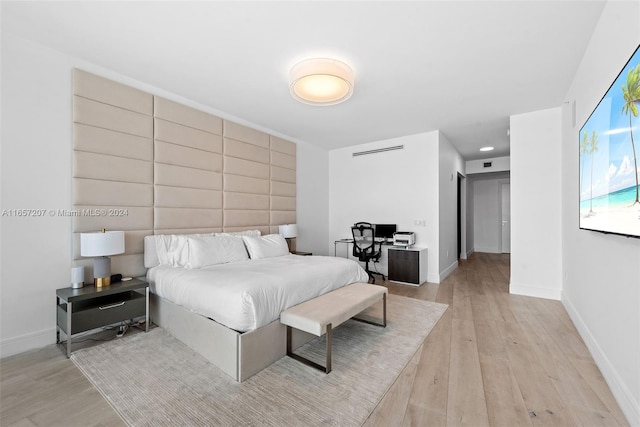 bedroom featuring light wood-type flooring