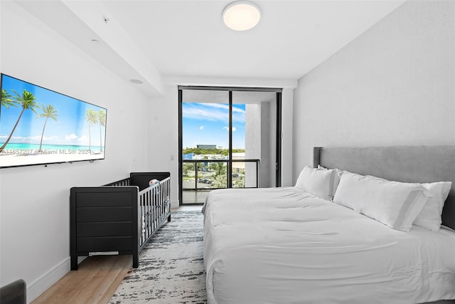 bedroom featuring light hardwood / wood-style flooring