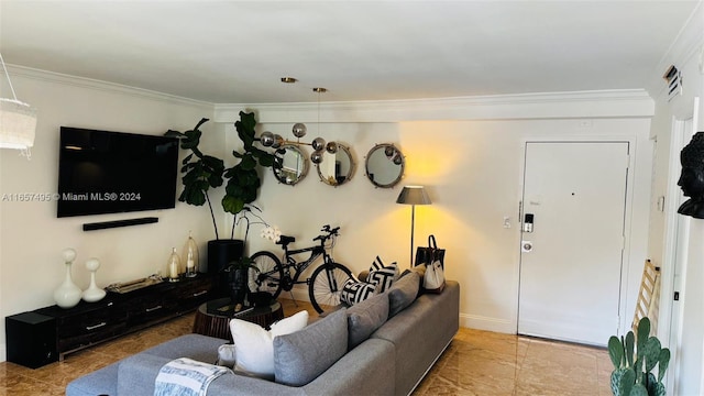 living room featuring ornamental molding and tile patterned floors