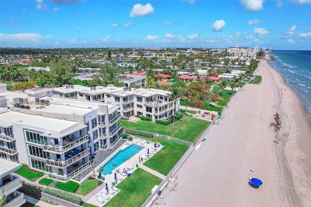 bird's eye view featuring a beach view and a water view