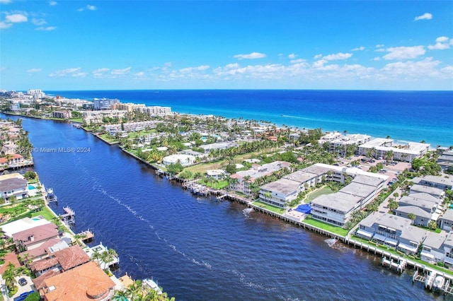 birds eye view of property featuring a water view