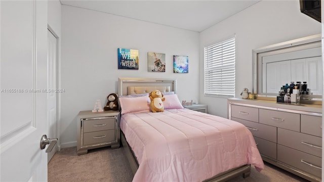 bedroom featuring carpet