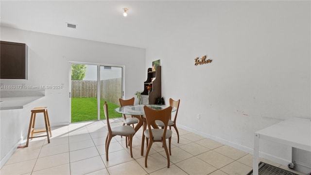 view of tiled dining space