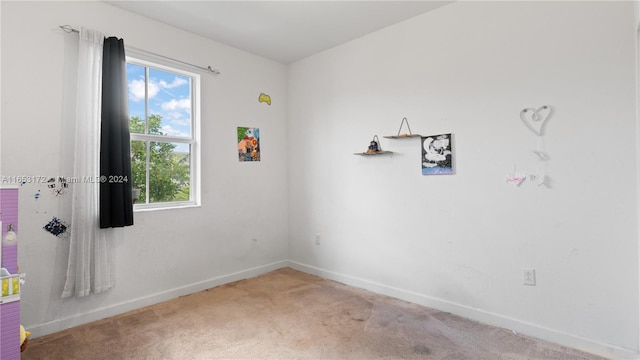 empty room with carpet flooring