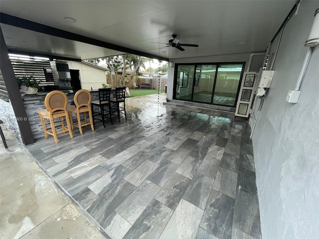 view of patio / terrace with ceiling fan