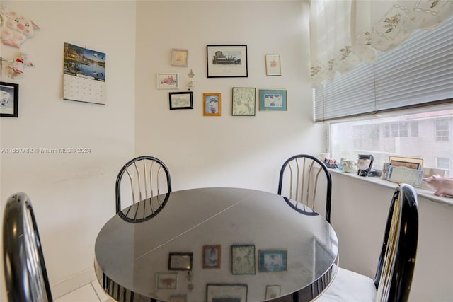 dining area featuring tile patterned floors