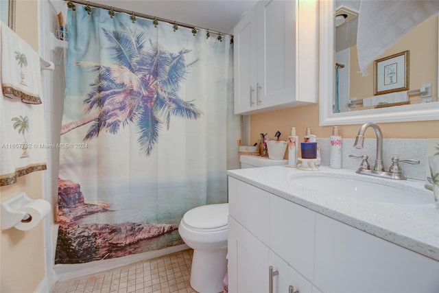 bathroom with walk in shower, vanity, and toilet