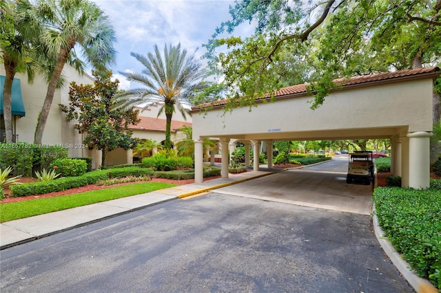 exterior space with a carport