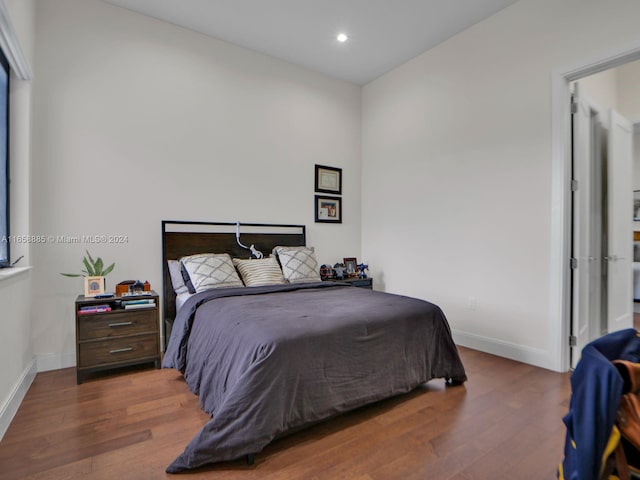 bedroom featuring wood-type flooring