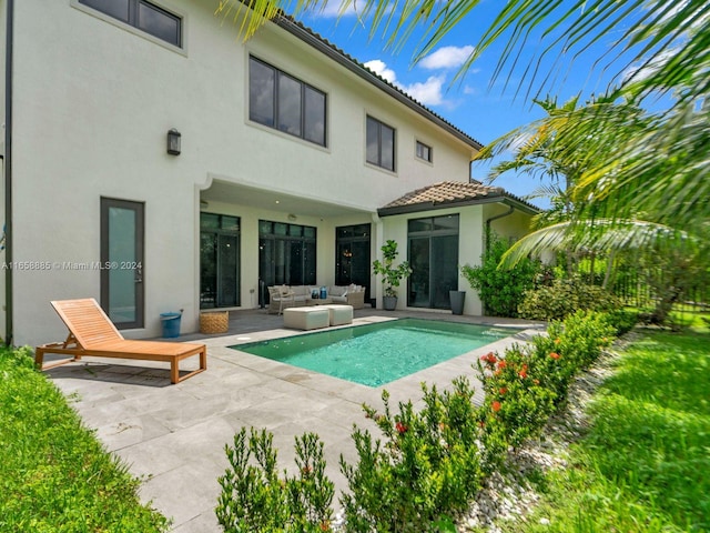 view of pool featuring a patio area