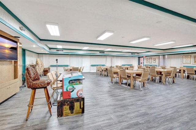 interior space featuring visible vents and wood finished floors