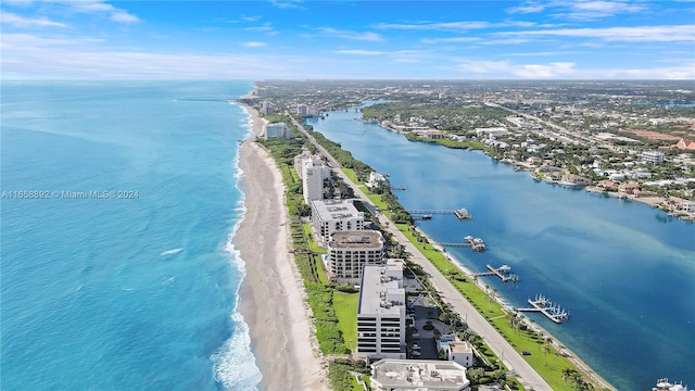 bird's eye view with a view of the beach and a water view