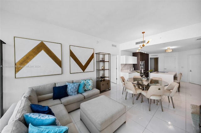 living room with light tile patterned flooring