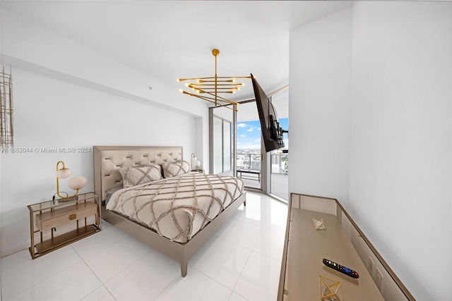 bedroom with light tile patterned floors, an inviting chandelier, a wall of windows, and access to exterior