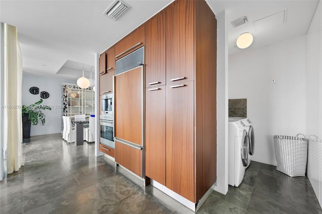 corridor featuring independent washer and dryer