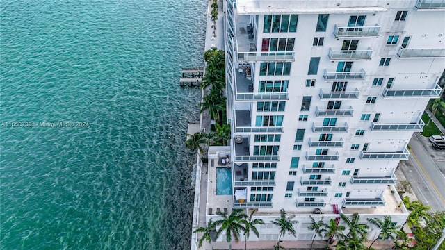 birds eye view of property featuring a water view