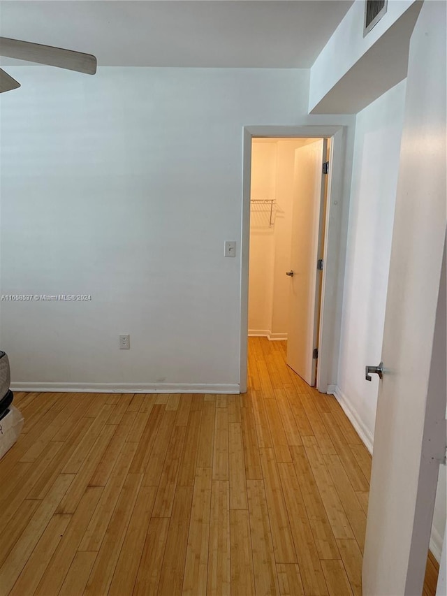 spare room featuring light hardwood / wood-style floors